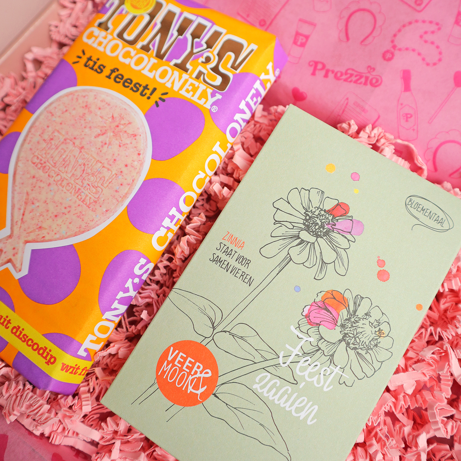 Brievenbus cadeaubox met Tony’s Chocolonely feestreep en bloemenzaadjes feest zaaien