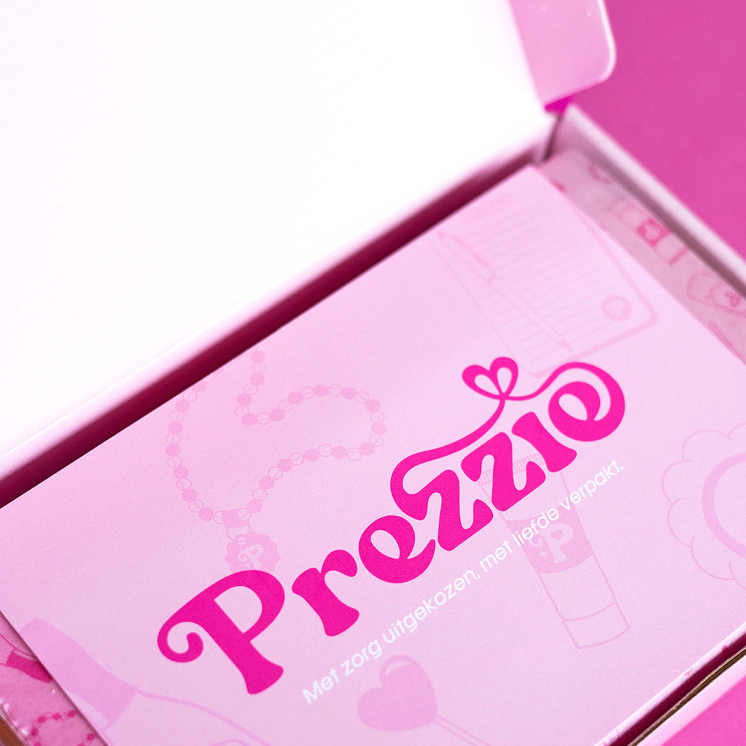 Roze ingepakt snoepcadeau van Prezzie voor zakelijke bestellingen en cadeautjes per post